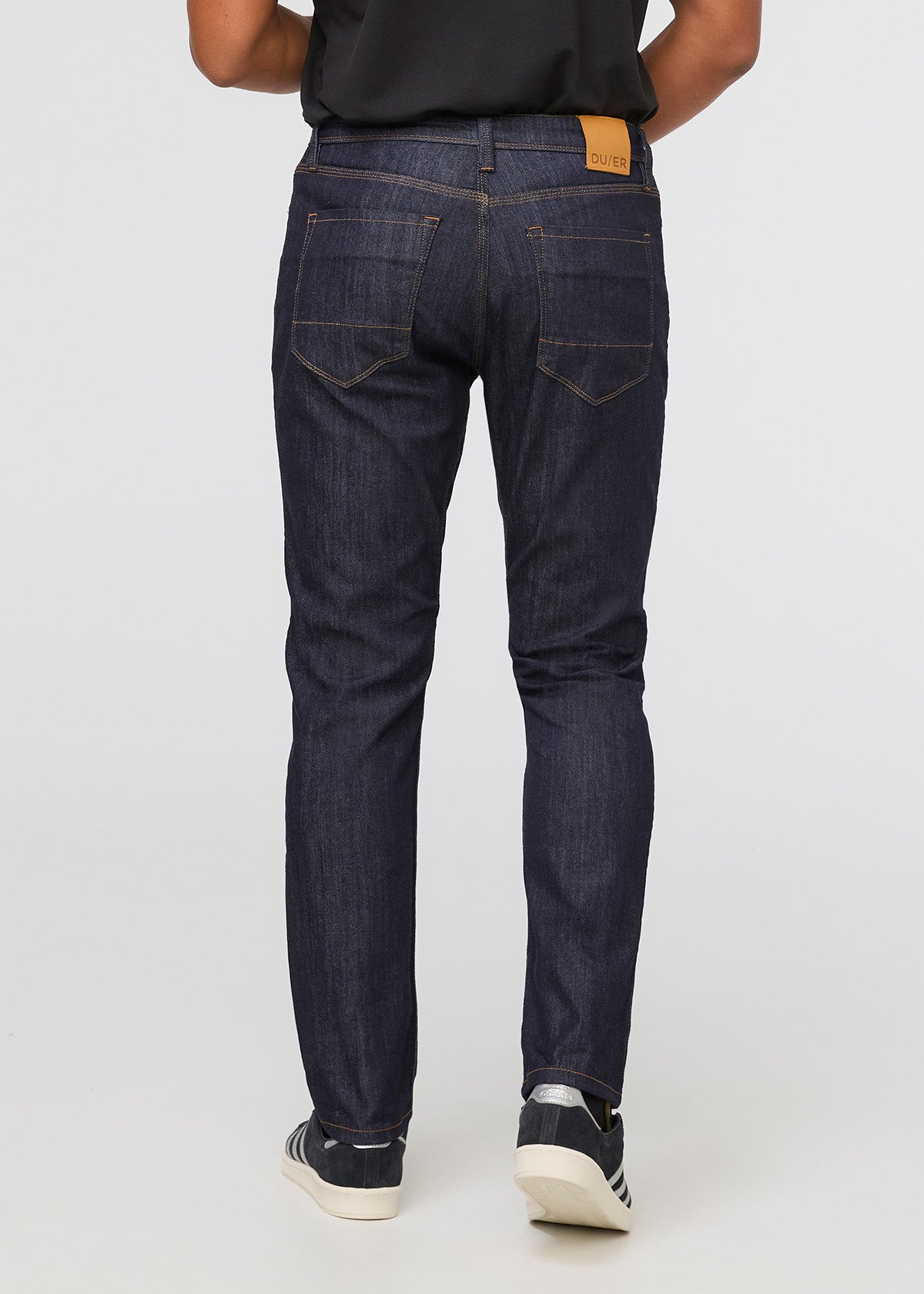 DUER Performance Denim Athletic Taper in Heritage Rinse