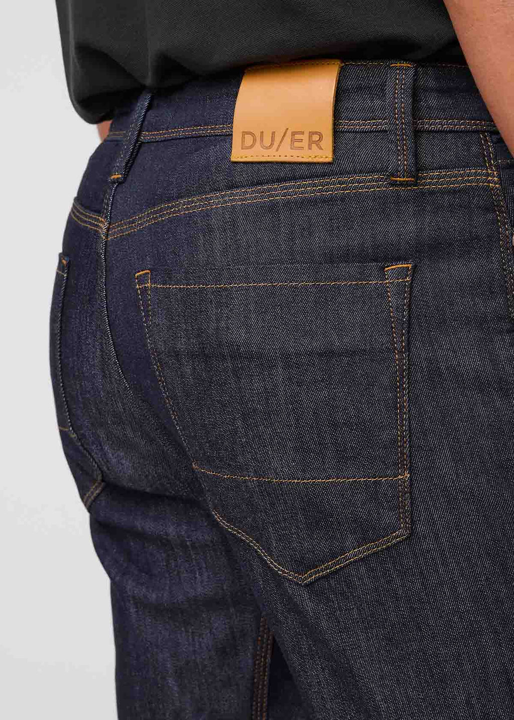DUER Performance Denim Athletic Taper in Heritage Rinse